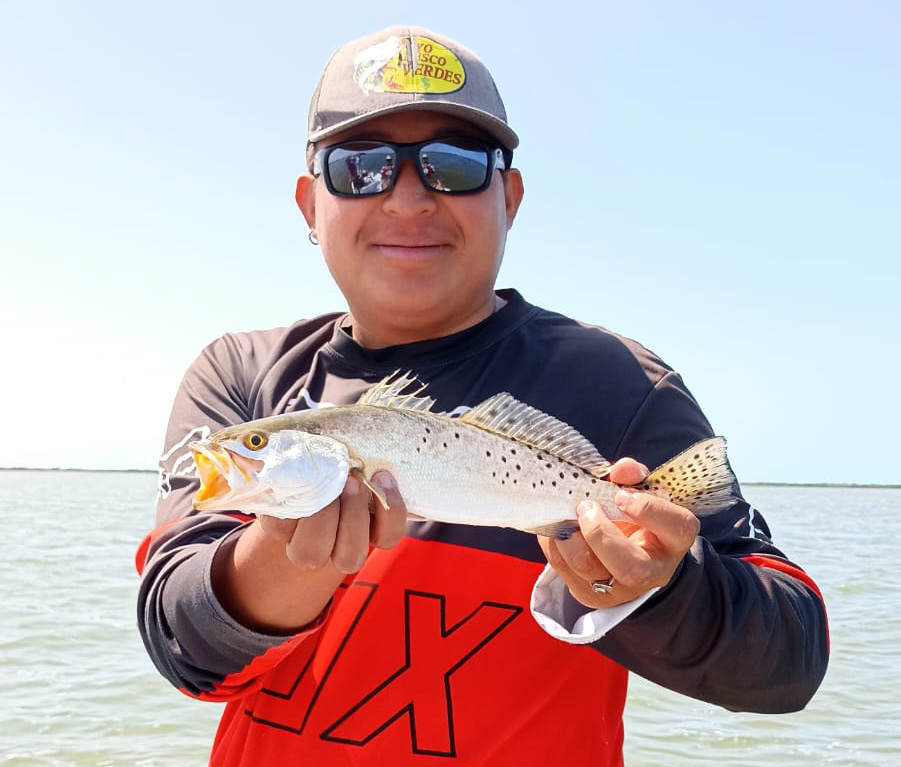 Marinaro holding a Snook fish.